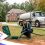 Septic tank pumping in Canton GA at a residential home with a Kaylor Septic technician checking the tank access