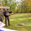 Winter septic maintenance in North Georgia with a homeowner and septic technician reviewing the system layout and property before colder weather